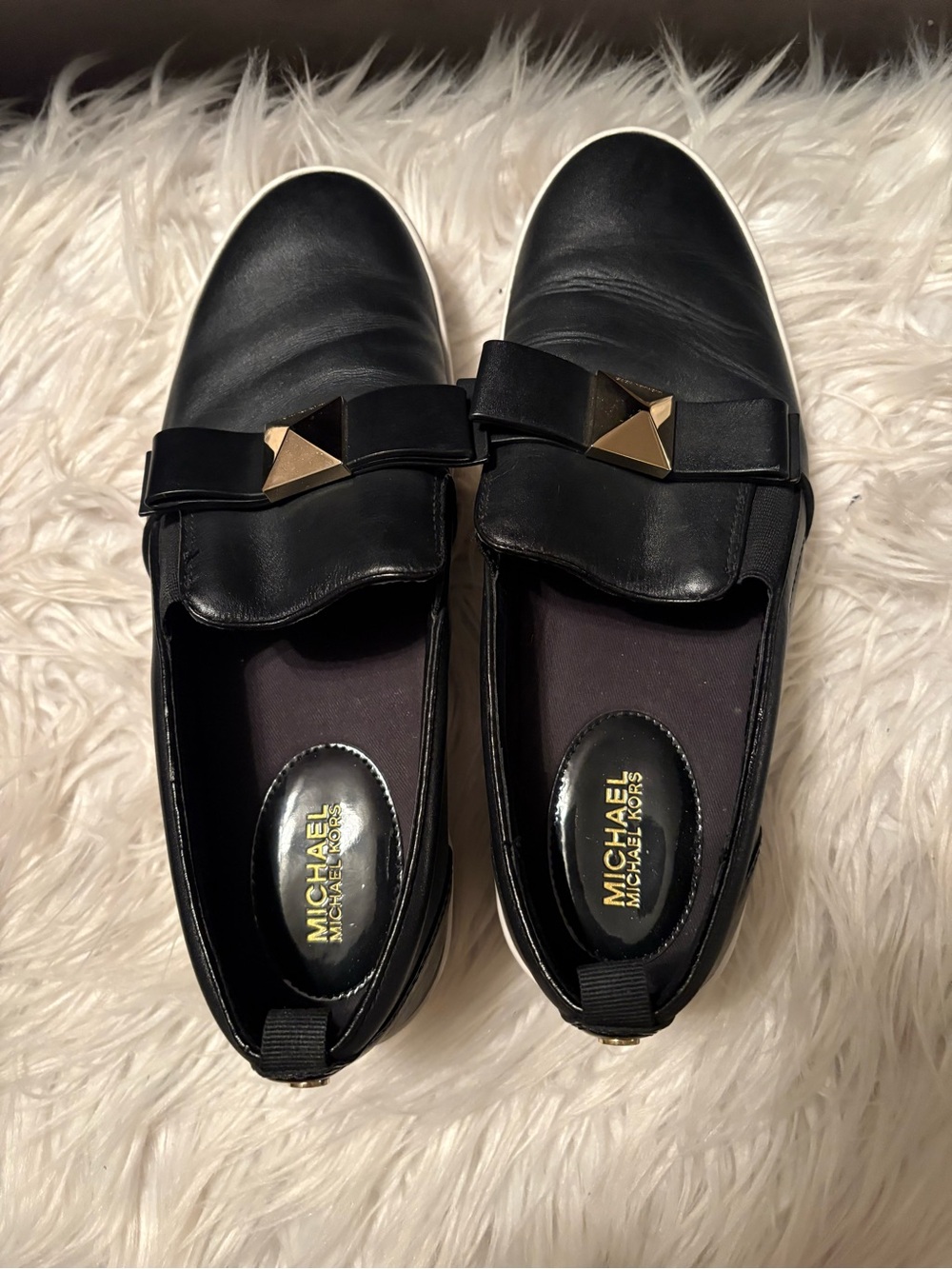 MICHAEL Michael Kors Black Slip-On Loafers with Gold Pyramid Accents